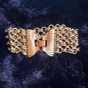Monet five chain gold tone bracelet. Measures 7-3/4 inches.
